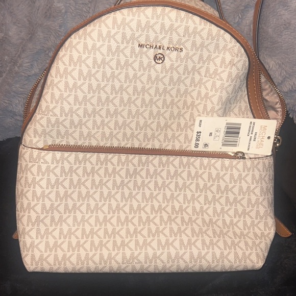 Mk back pack purse brand new. Bought and never used. - Picture 7 of 7
